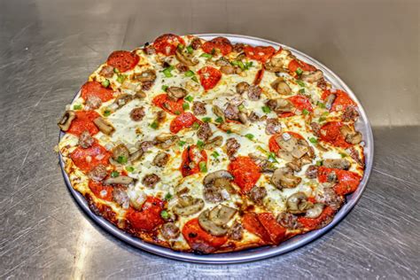 Jacs pizza - Choose From Any Vegetarian Pizza Items or "Lettuce" Give you The Works! Gyro. Sliced Gyro Meat, Provolone Cheese, Italian Dressing & Chef Charles' Pesto. Salads. Full Salad $9.99 Half Salad $5.75 *Full Side Salad $7.99 *Half Side Salad $4.75. Mediterranean.